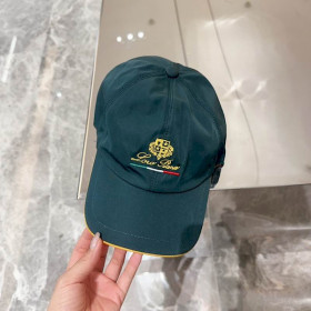 Loro Piana Baseball Cap with Elasticated back Microfibre Storm System in dark green and yellow