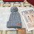 Loro Piana Women's Cashmere Beanie with Pom-Pom in dusty blue